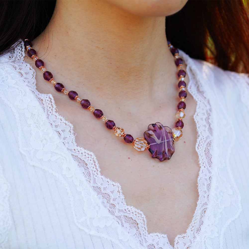 Sea shell necklace, made with Sunstone faceted Czech purple beads finished in popular silver plated tubes, clasp & spacers make this choker pendant